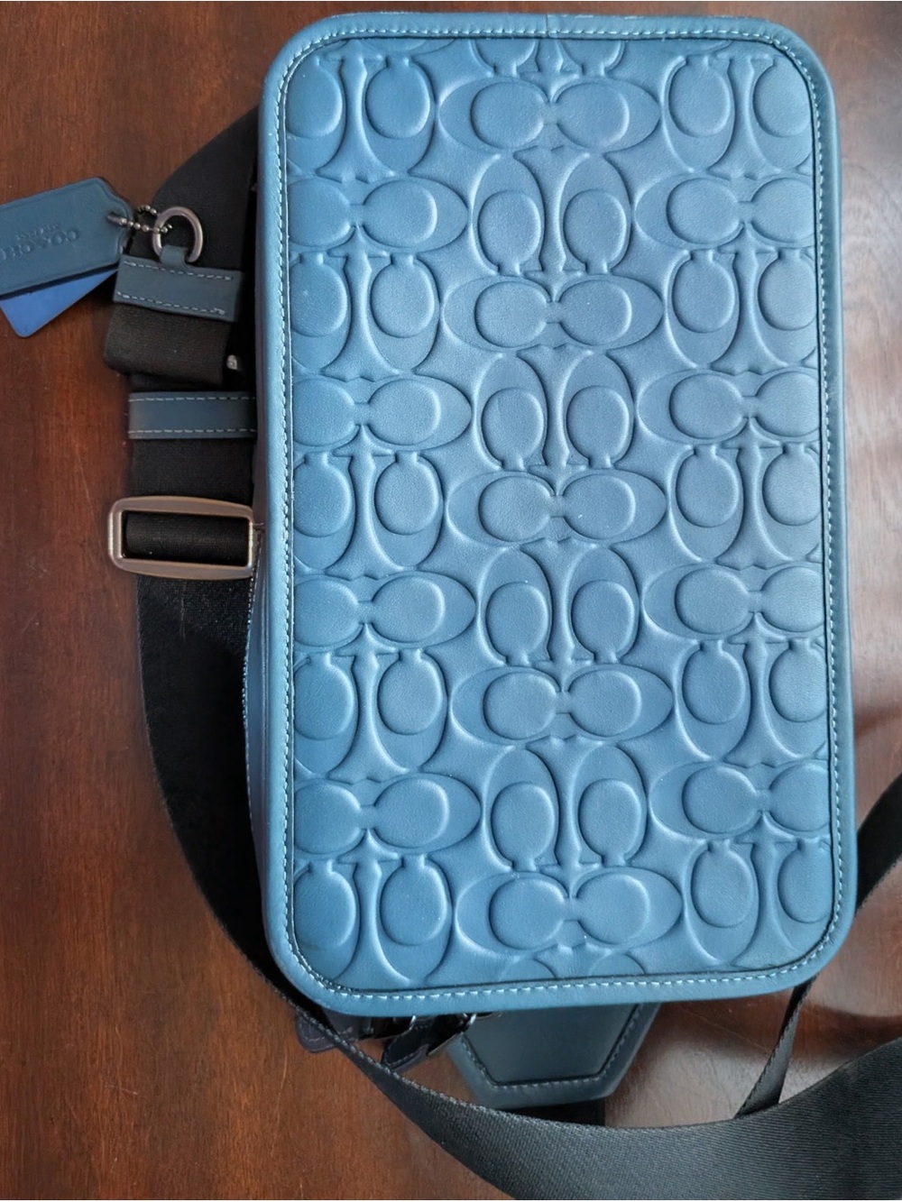 Coach Men's Light Blue Embossed Signature Sling Belt Bag